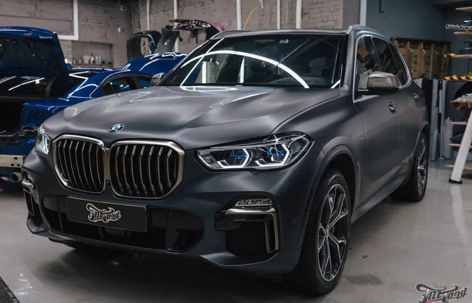 Перетянули потолок и руль на BMW X5